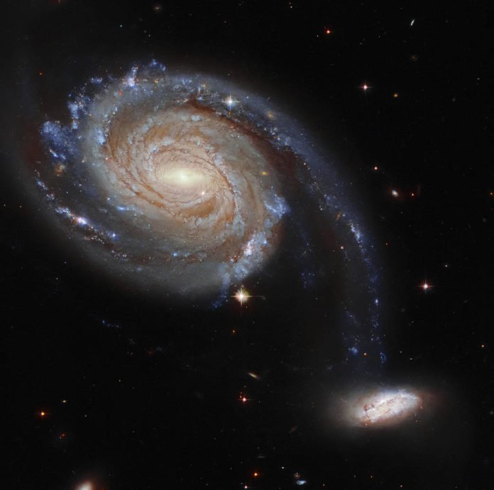 Hubble registra uma peculiar dança intergaláctica Hubble registra uma peculiar dança intergaláctica