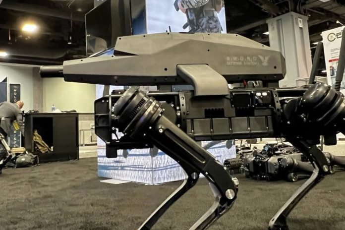 Empresa desenvolve cão robótico armado com rifle para o Exército dos EUA Empresa desenvolve cão robótico armado com rifle para o Exército dos EUA
